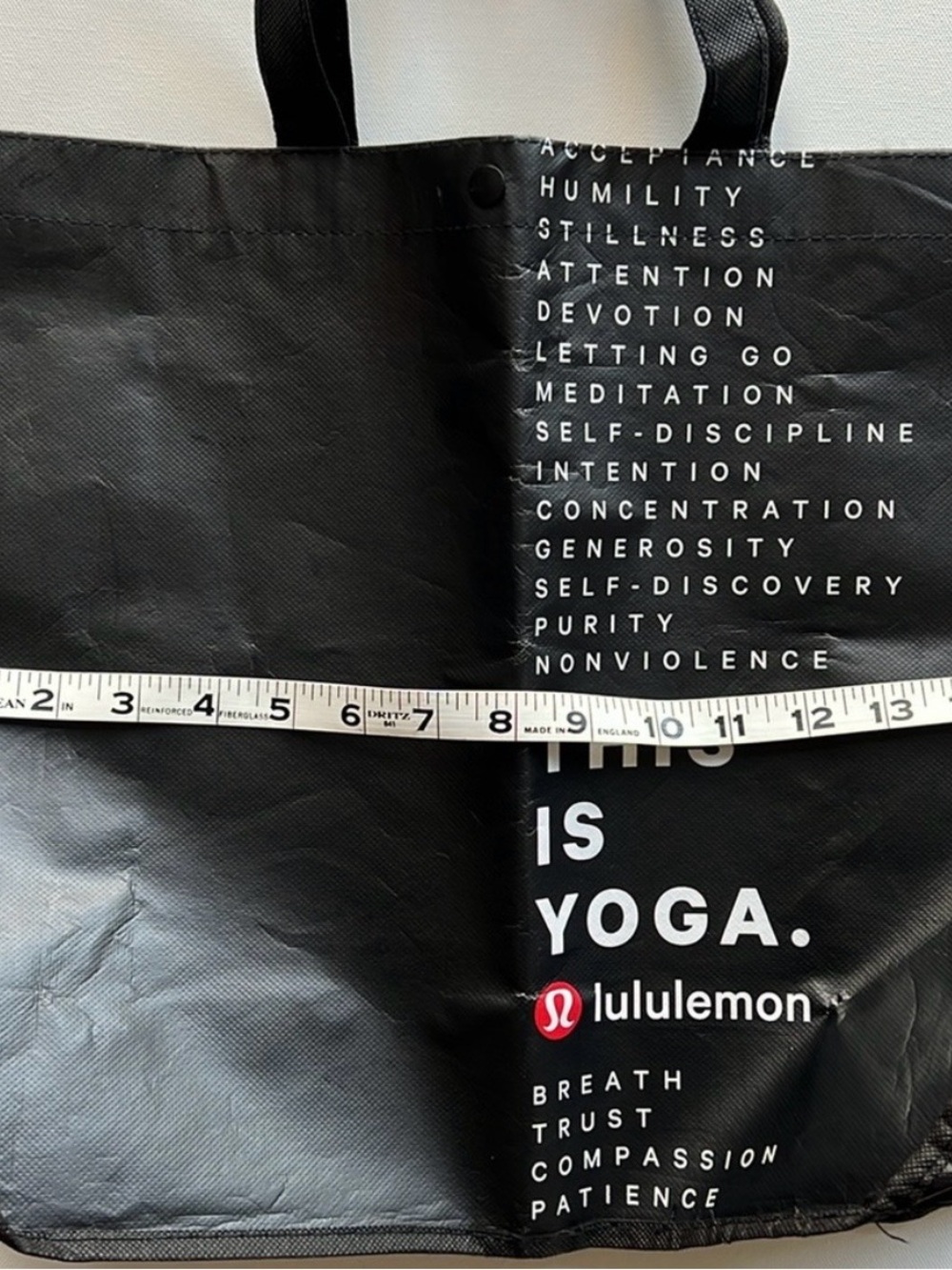 lululemon athletica Black Tote Bag with White Logo Text and Red Emblem